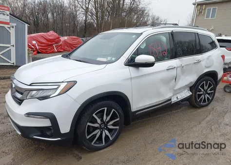 2021 Honda Pilot Awd Touring 8 Passenger z USA, uszkodzony, nr VIN 5FNYF6H96MB038234